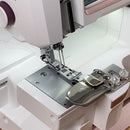 Husqvarna Viking Coverstitch Hemmer — vue du fabricant